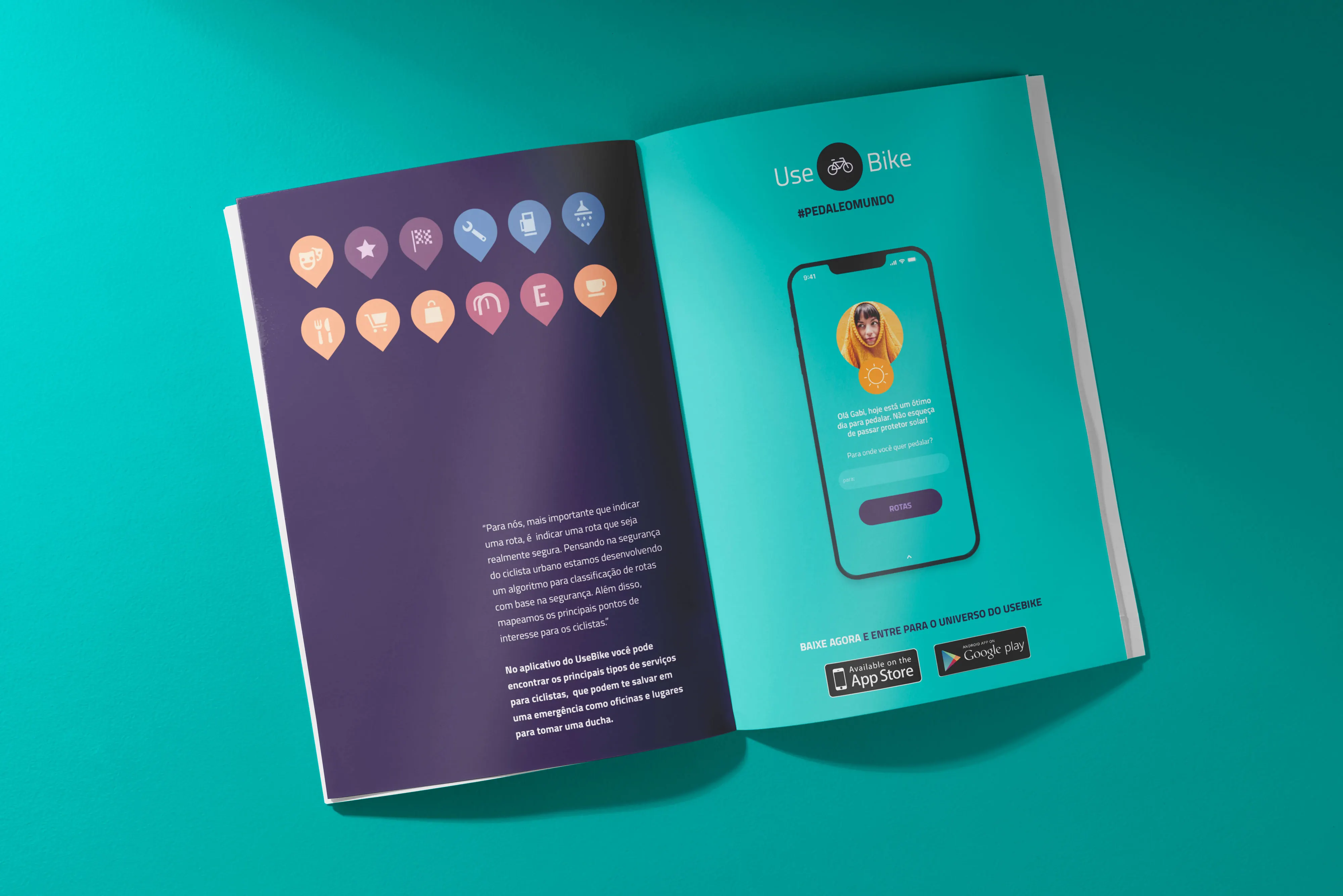 An open magazine on teal: the left page shows a grid of place-category pins and text about route safety, the right is a UseBike ad with the app on a phone.